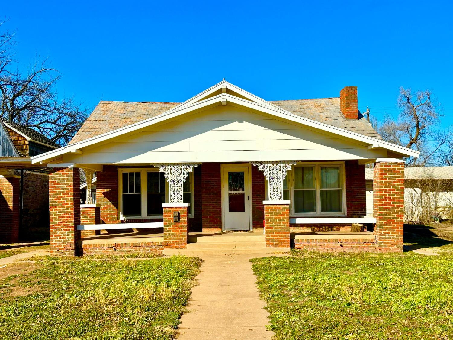 a view of a house with sink and floor to ceiling windows