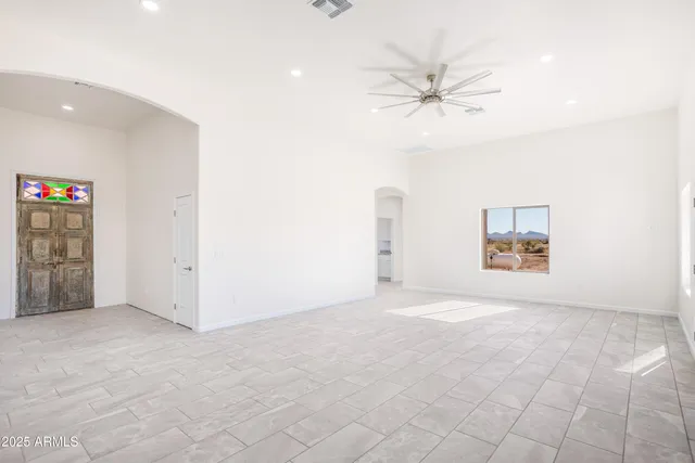 a view of a kitchen with a sink and a window