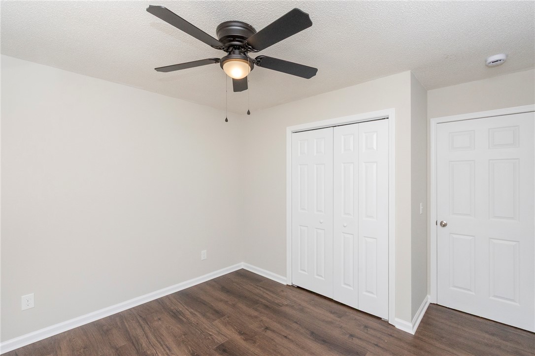 113 Linda Lane Honea Path, SC 29654 - Photo 18 of 36 This airy bedroom features sleek wood flooring and ample closet space for a refreshing living experience.