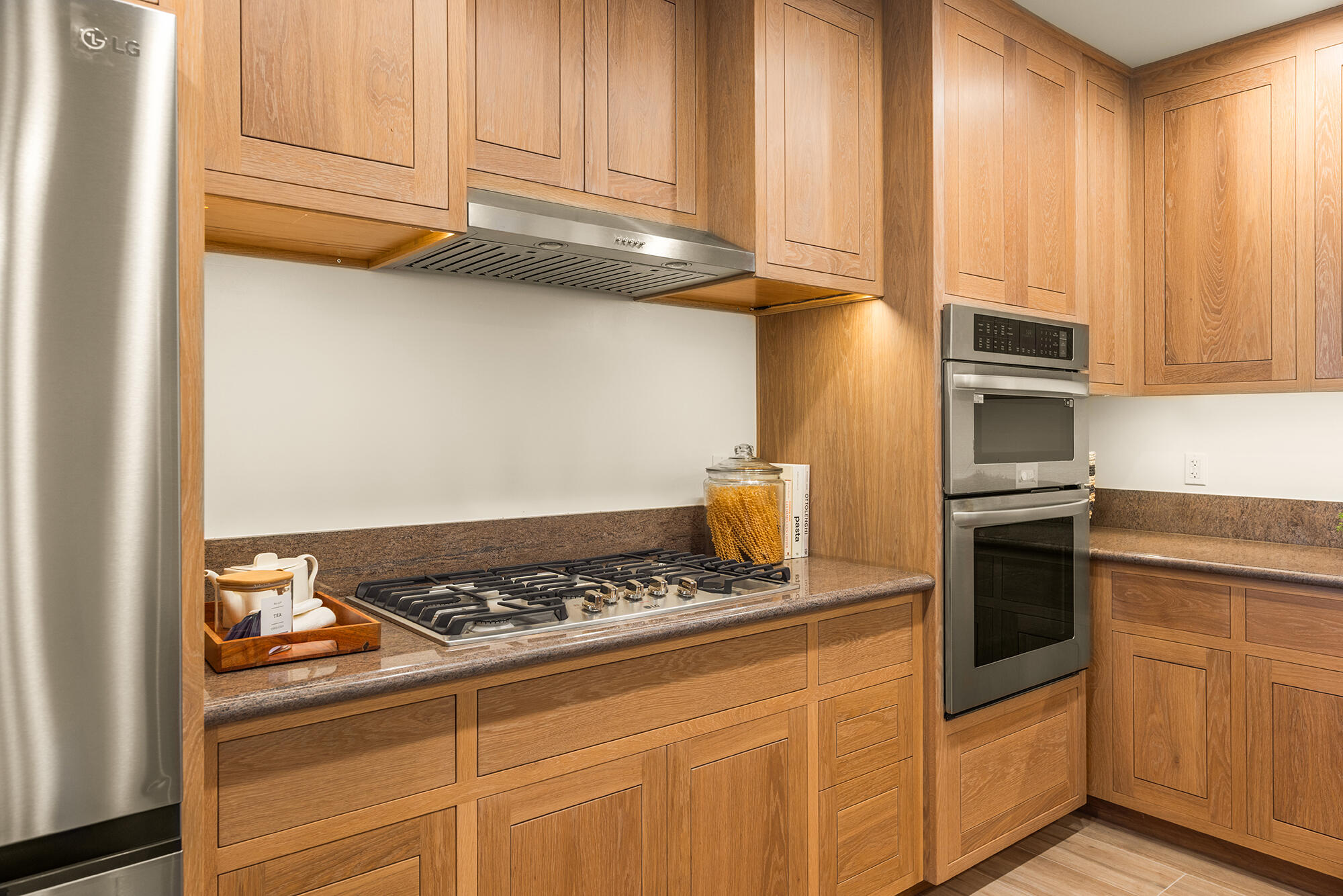 1068 Cuyama Road Ojai, CA 93023 - Photo 19 of 43 a kitchen with granite countertop stainless steel appliances and cabinets