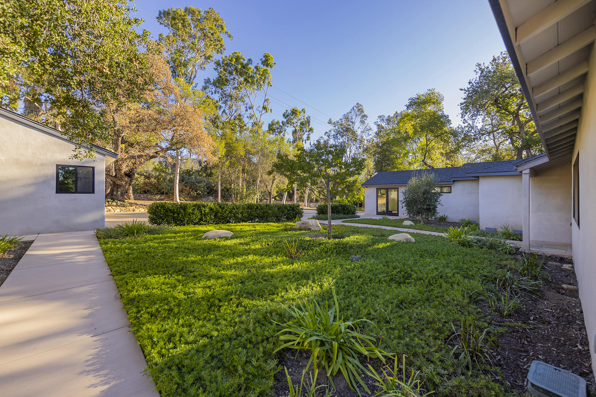 1068 Cuyama Road Ojai, CA 93023 - Photo 22 of 43 a view of a yard with plants and a trees