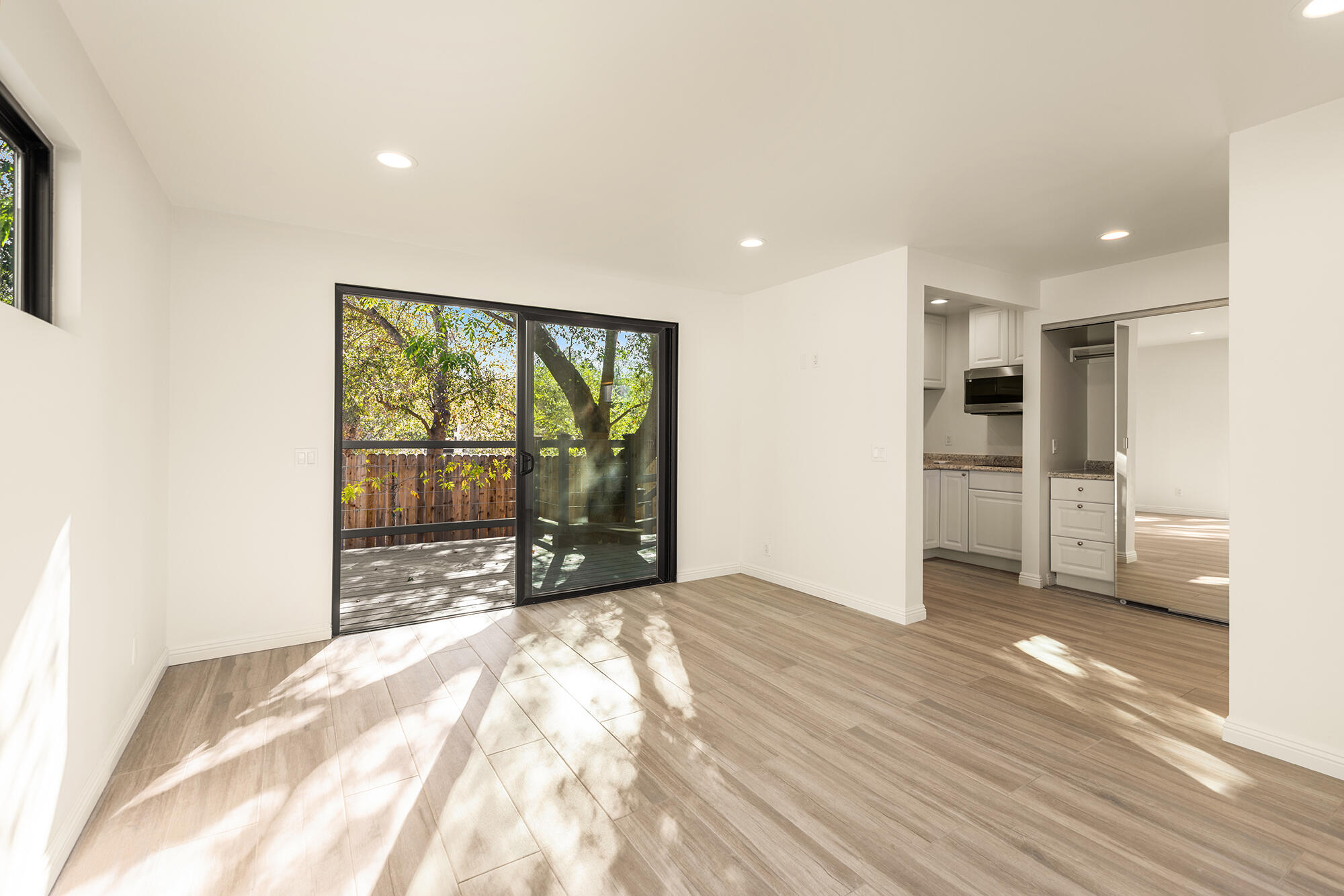 1068 Cuyama Road Ojai, CA 93023 - Photo 25 of 43 a view of empty room with wooden floor and floor to ceiling window