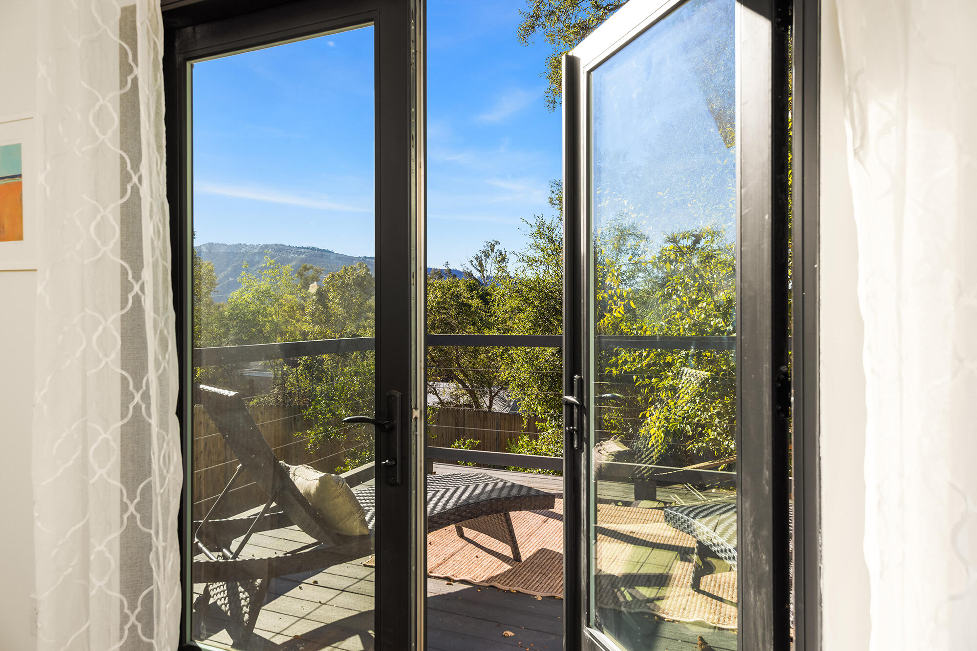 1068 Cuyama Road Ojai, CA 93023 - Photo 10 of 43 a view of a glass door with a balcony from a window