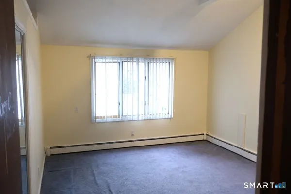 an empty room with a window
