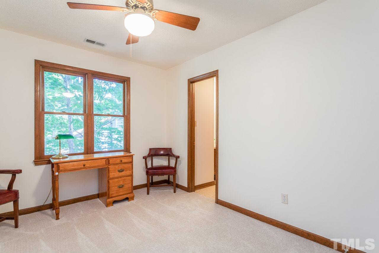 6679 English Ivy Lane Raleigh, NC 27615 - Photo 16 of 24 a room with furniture and a window