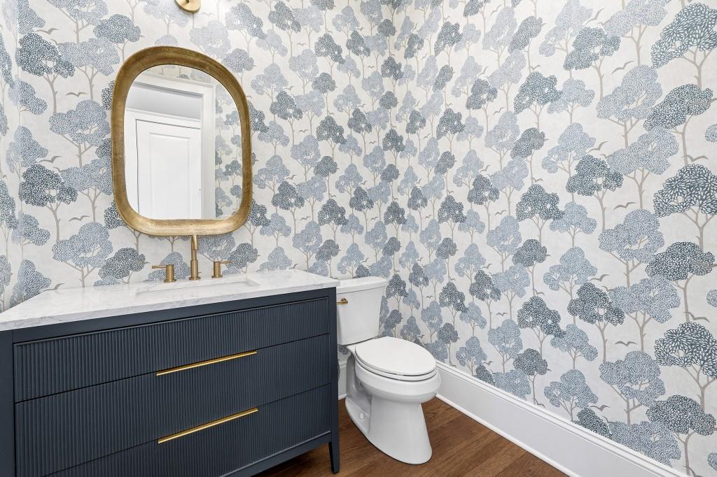 286 County Road Southwest Marietta, GA 30064 - Photo 19 of 40 a bathroom with a toilet sink and mirror