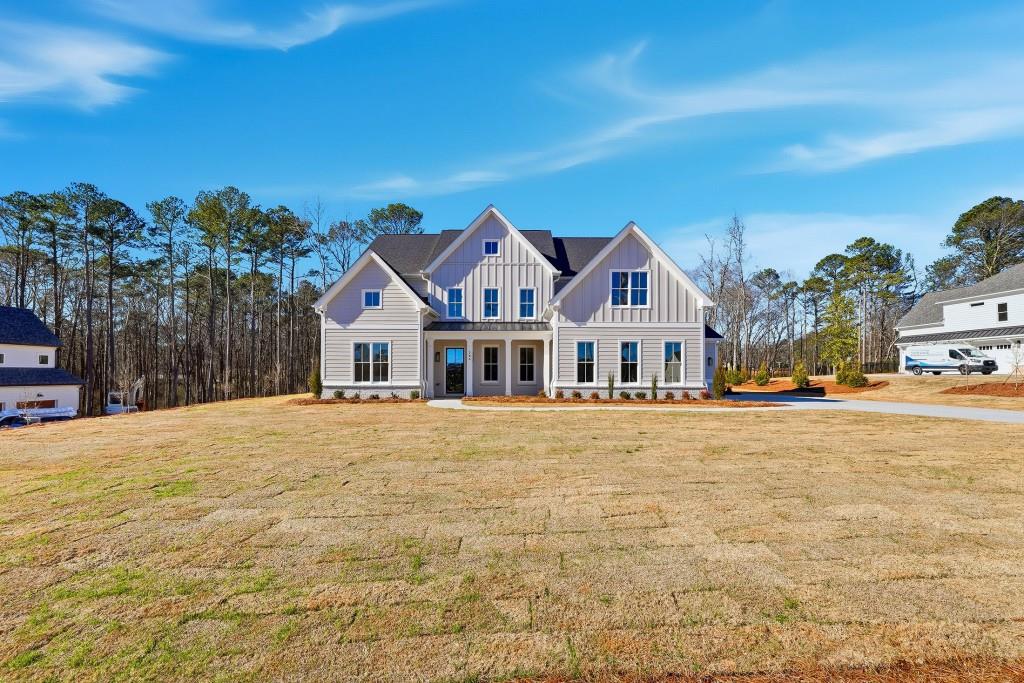 286 County Road Southwest Marietta, GA 30064 - Photo 2 of 40 a front view of a house with a garden