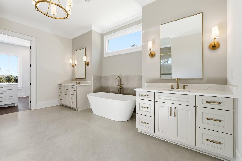 286 County Road Southwest Marietta, GA 30064 - Photo 23 of 40 a spacious bathroom with a double vanity sink mirror and bathtub