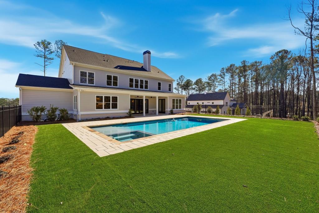 286 County Road Southwest Marietta, GA 30064 - Photo 40 of 40 a view of house with swimming pool yard fire pit and outdoor seating