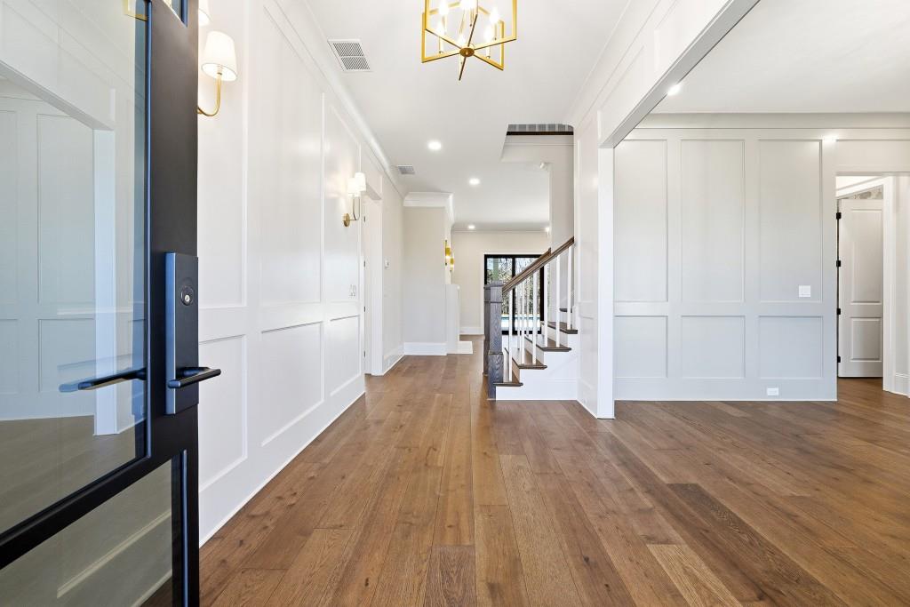 286 County Road Southwest Marietta, GA 30064 - Photo 5 of 40 a view of a hallway with wooden floor and staircase