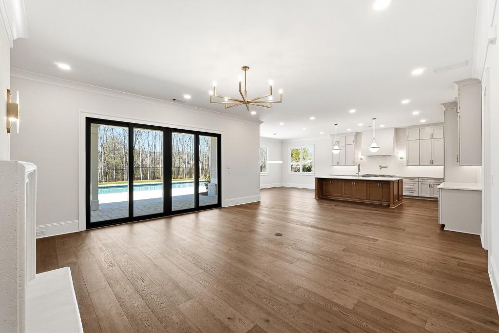 286 County Road Southwest Marietta, GA 30064 - Photo 8 of 40 a view of kitchen with furniture and wooden floor