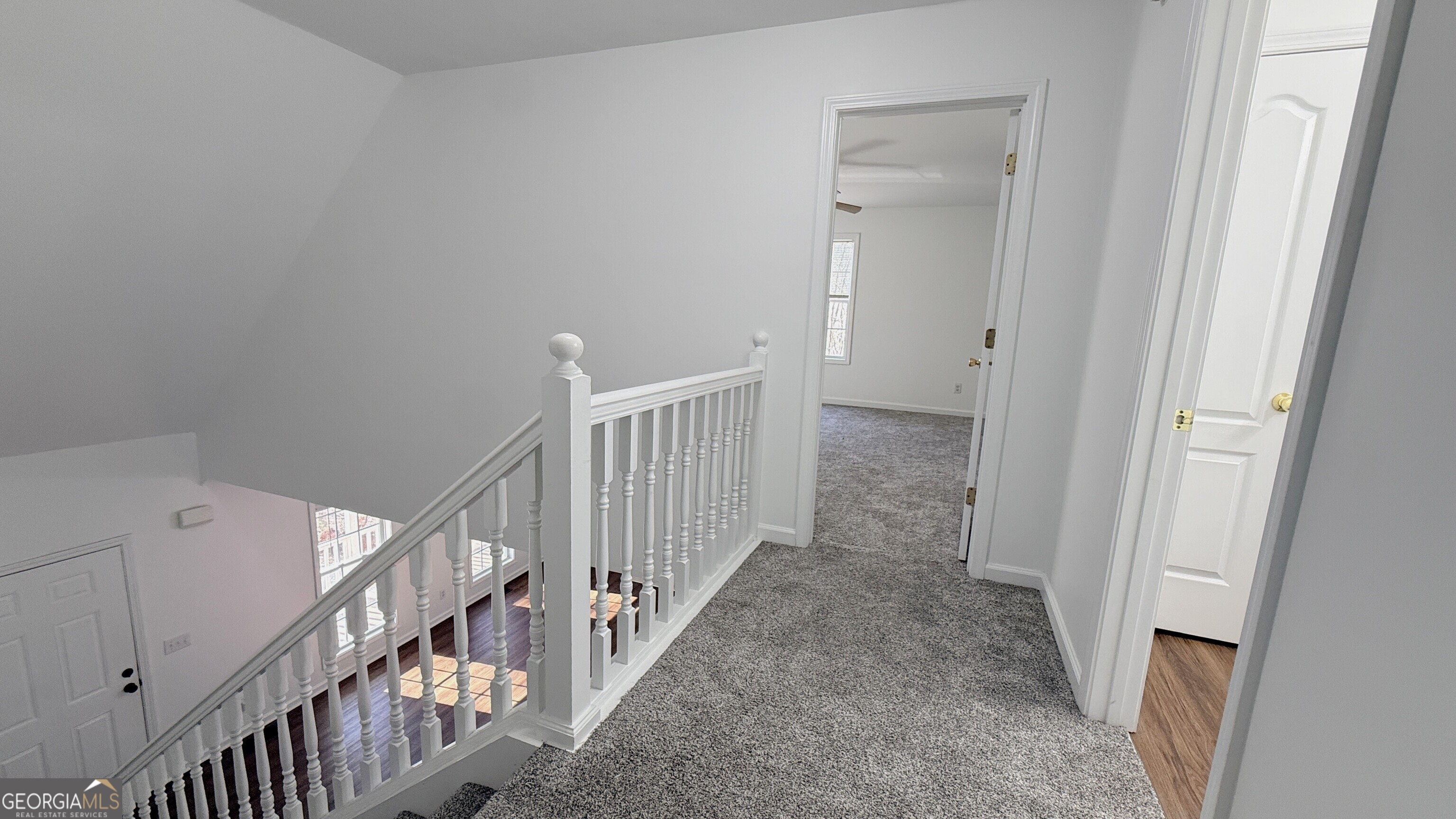 3395 Woodlake Lane Villa Rica, GA 30180 - Photo 11 of 25 a view of a hallway with staircase