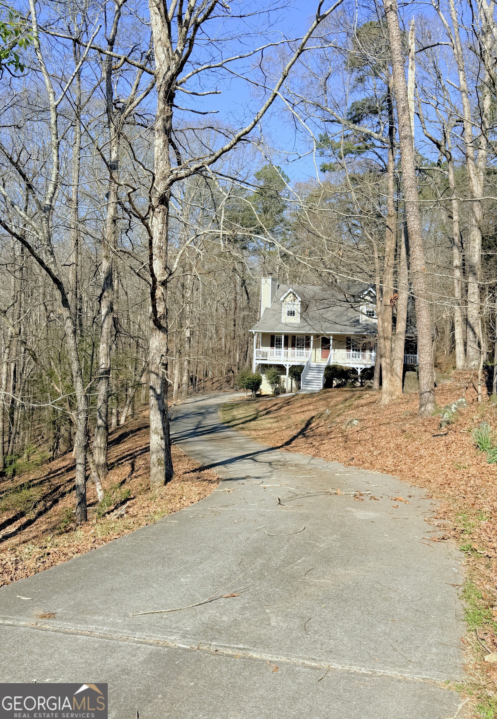 3395 Woodlake Lane Villa Rica, GA 30180 - Photo 2 of 25 a view of road with large building
