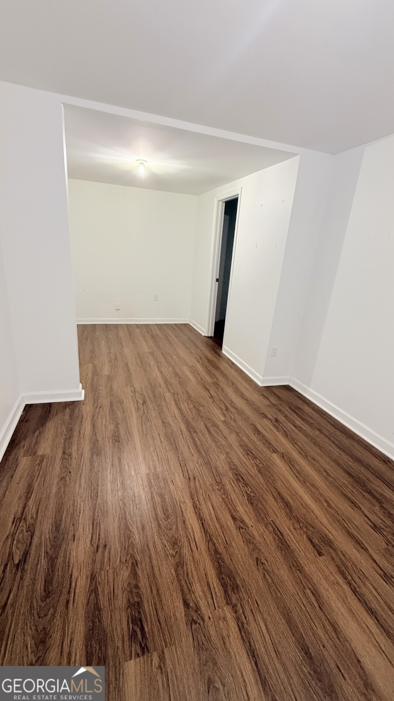3395 Woodlake Lane Villa Rica, GA 30180 - Photo 23 of 25 a view of a room with wooden floor