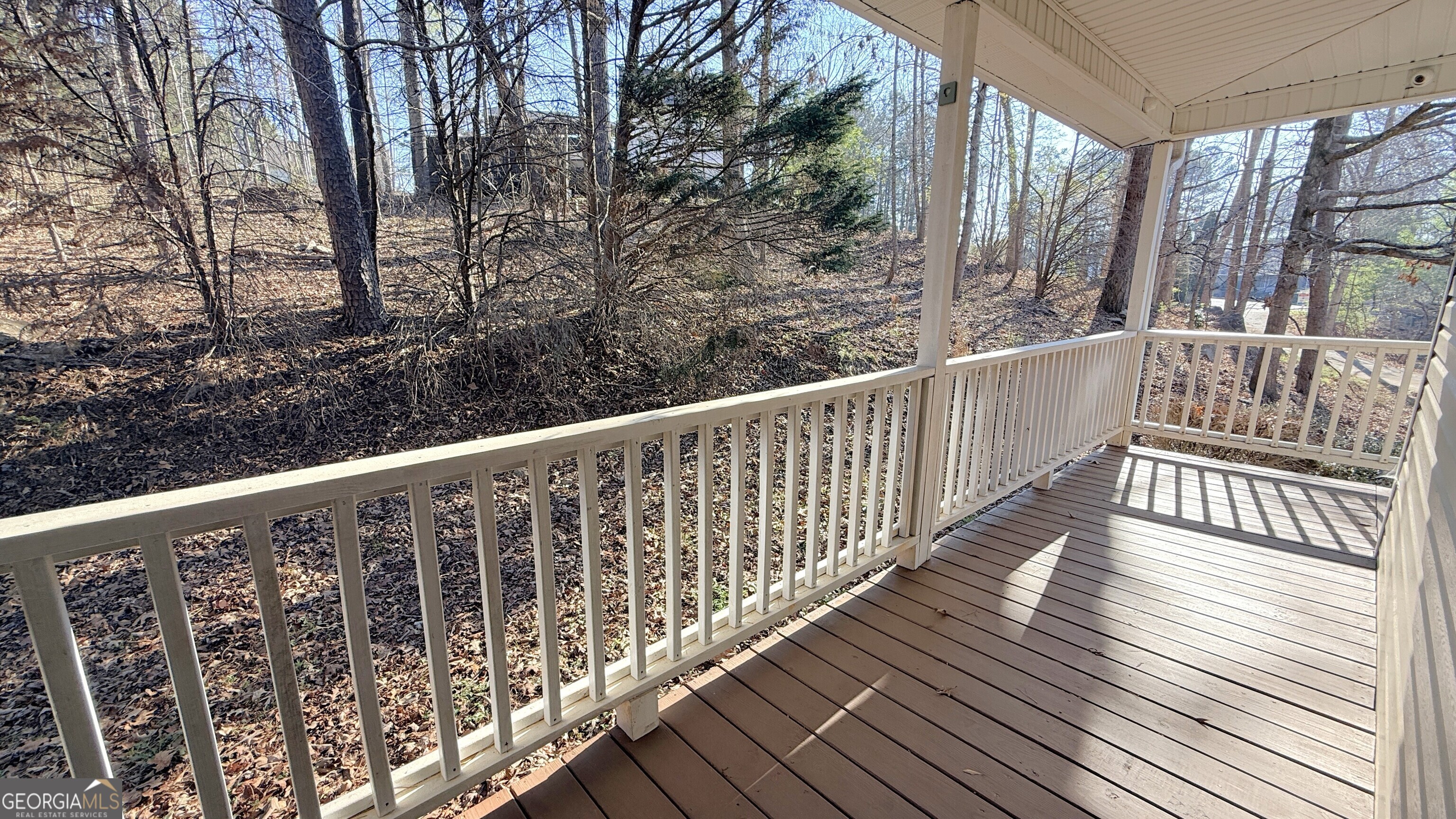 3395 Woodlake Lane Villa Rica, GA 30180 - Photo 9 of 25 a view of balcony with wooden floor and fence
