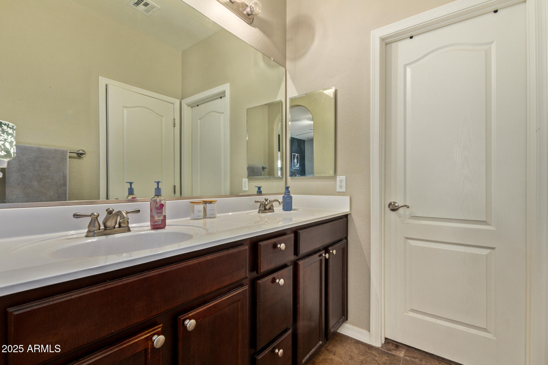 7726 East Baseline Road, Unit 234 Mesa, AZ 85209 - Photo 12 of 31 a bathroom with a double vanity sink and a mirror