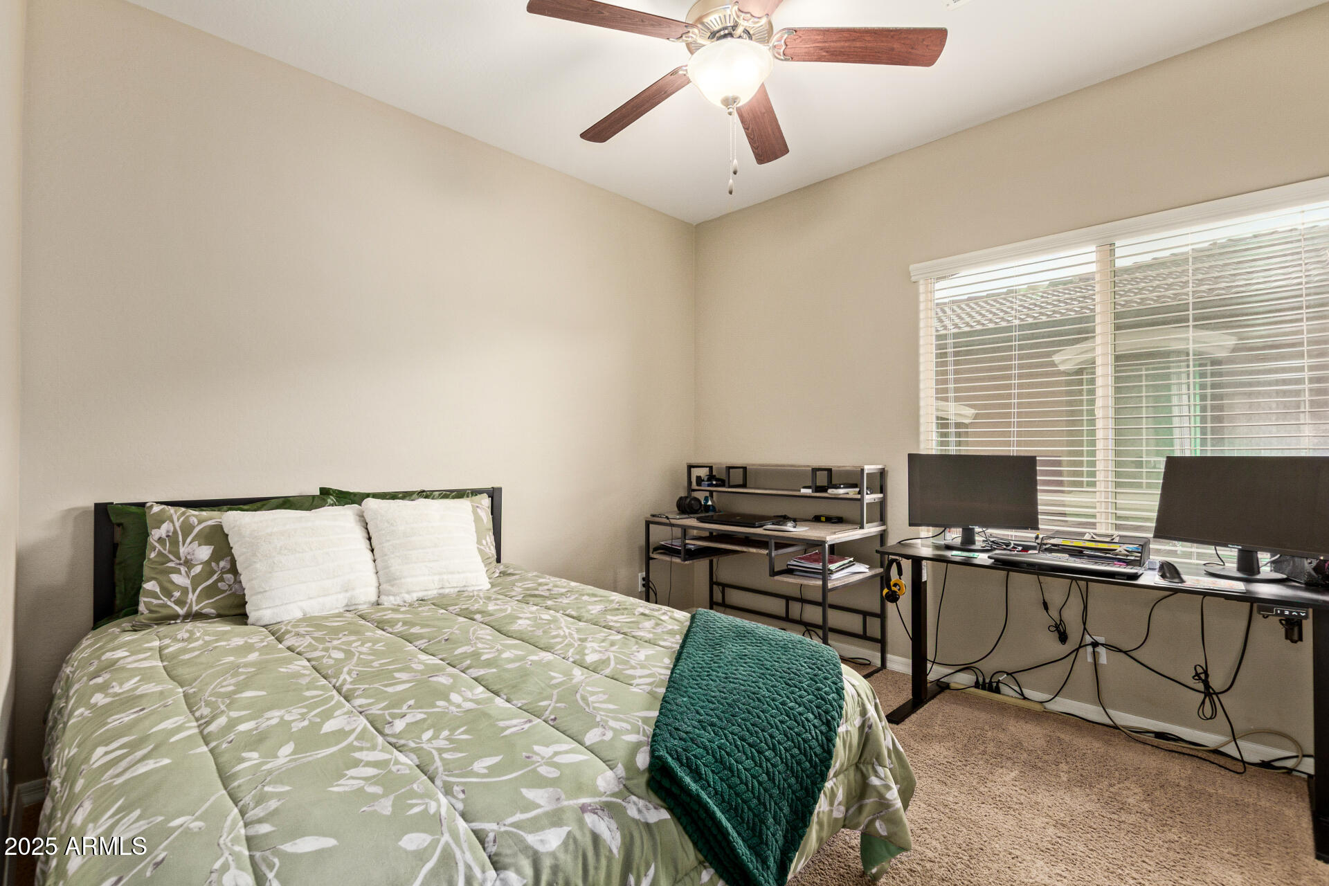 7726 East Baseline Road, Unit 234 Mesa, AZ 85209 - Photo 16 of 31 a bedroom with a bed and a desk