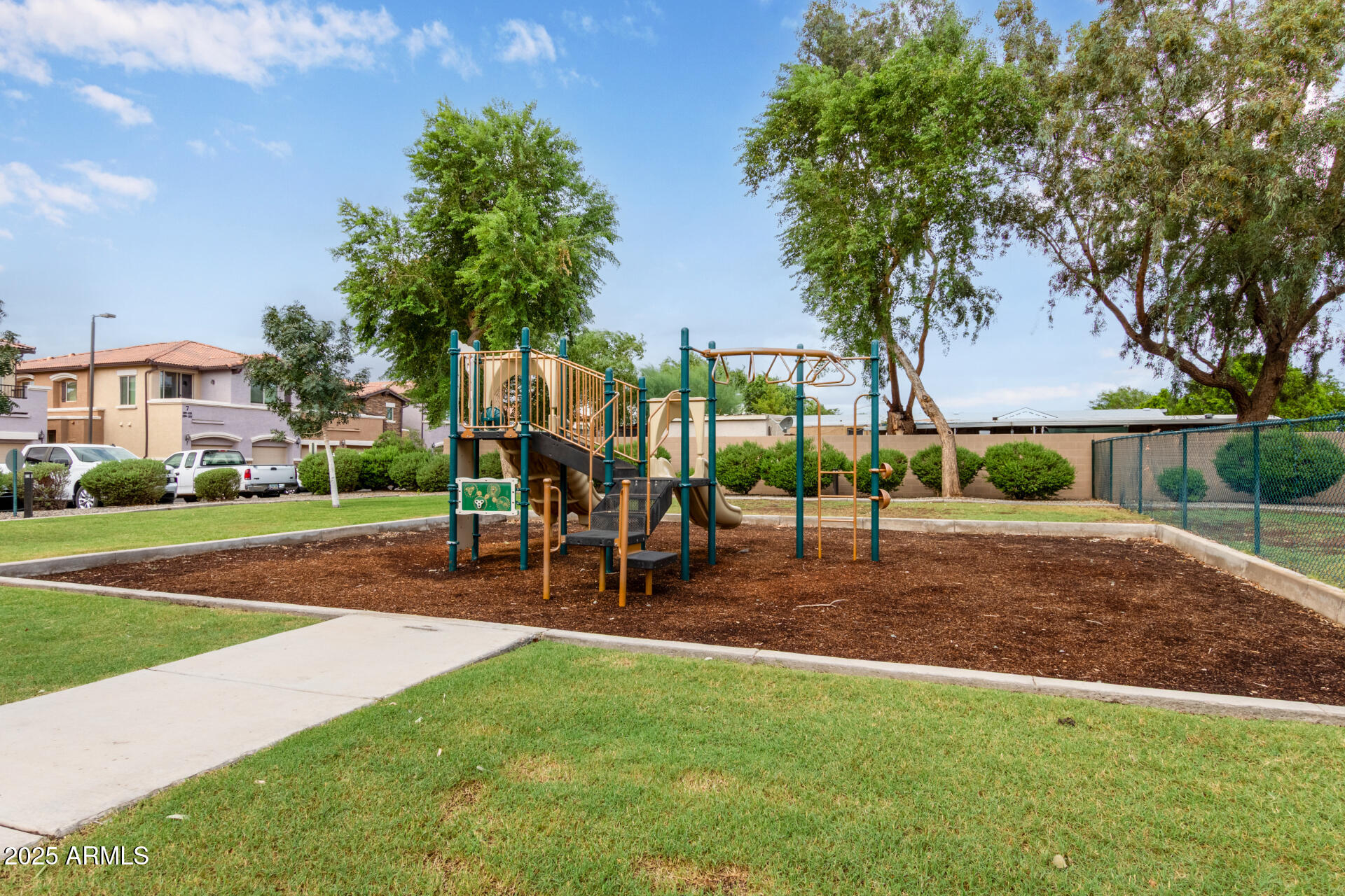7726 East Baseline Road, Unit 234 Mesa, AZ 85209 - Photo 29 of 31 a view of a park with large trees