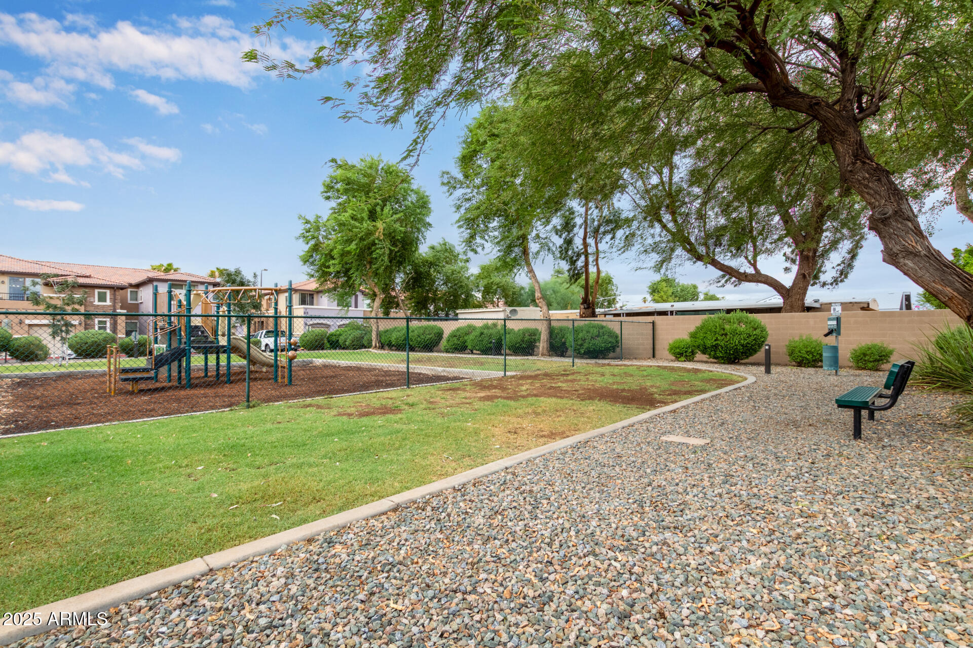 7726 East Baseline Road, Unit 234 Mesa, AZ 85209 - Photo 30 of 31 a view of a park with large trees
