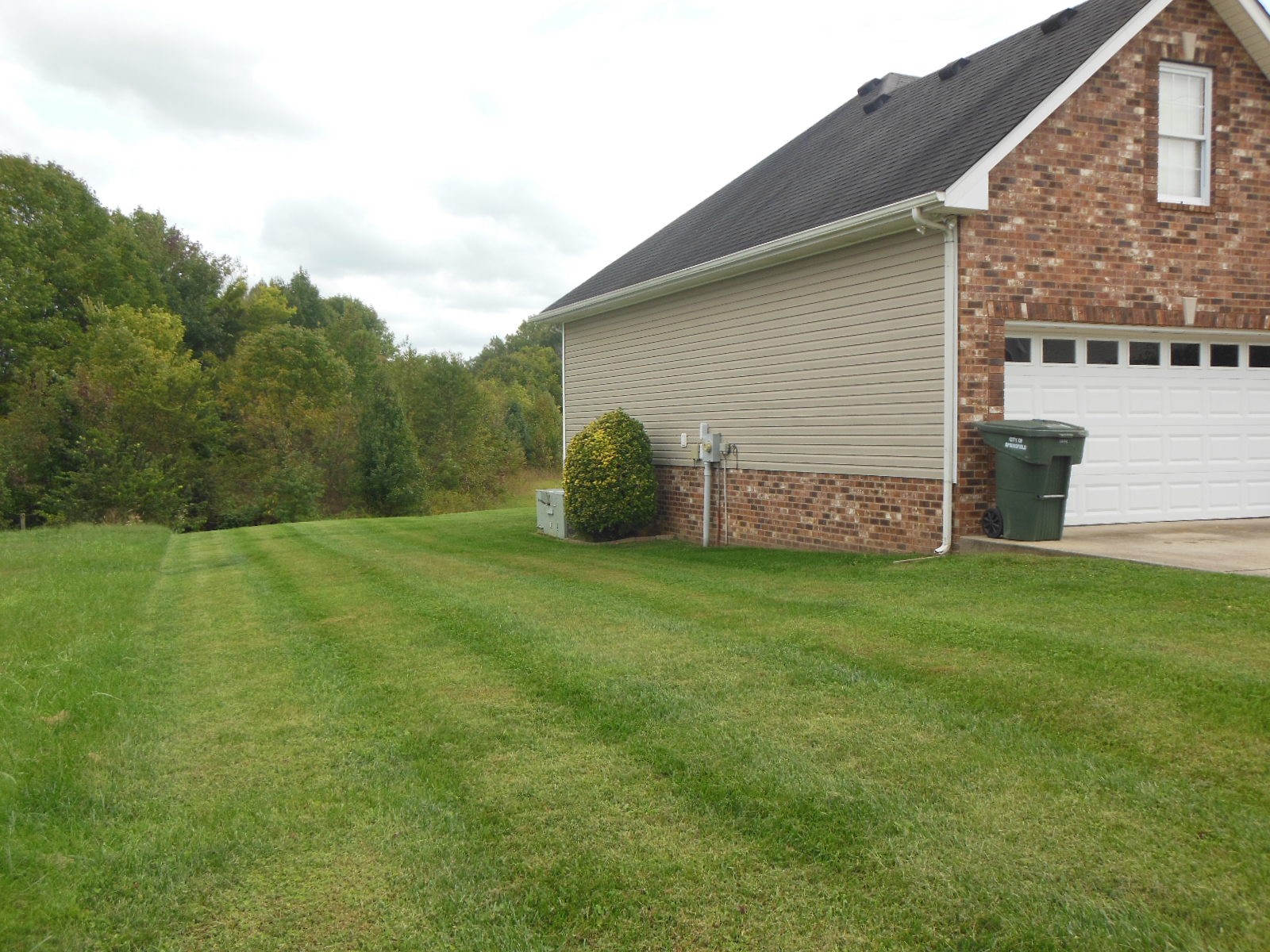 321 Arabian Lane Springfield, TN 37172 - Photo 19 of 23 a backyard of a house with lots of green space