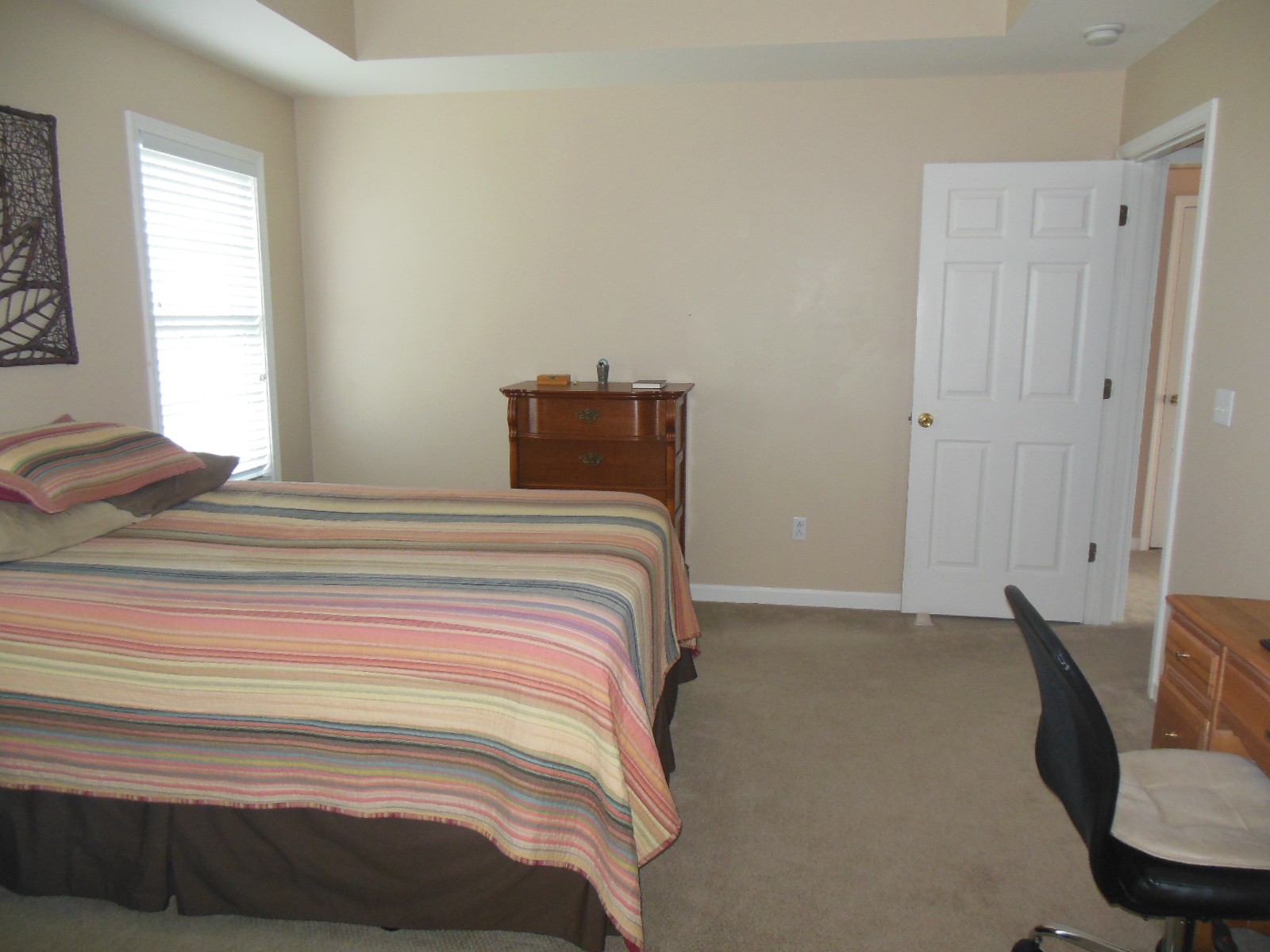 321 Arabian Lane Springfield, TN 37172 - Photo 9 of 23 a bedroom with a bed and chair
