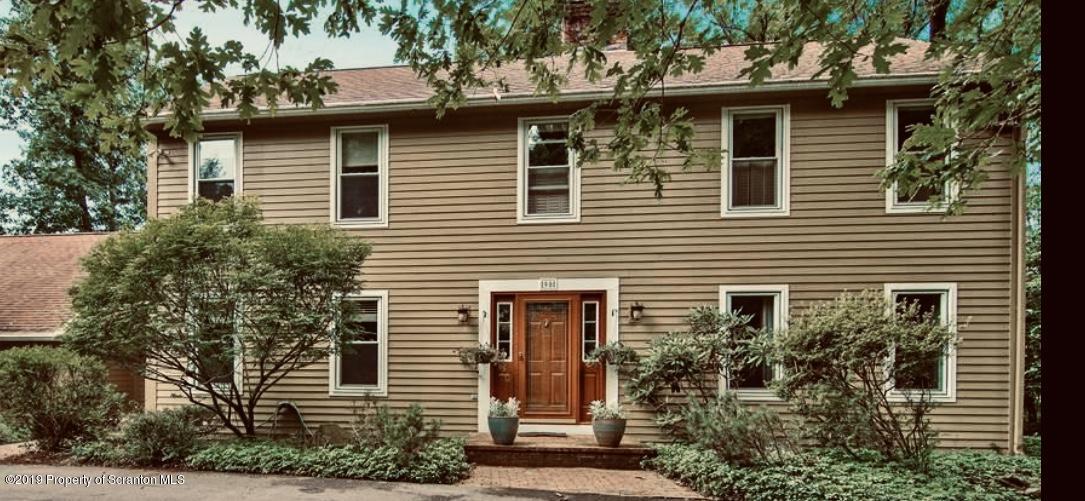 90 Sedler Road Dallas, PA 18612 - Photo 1 of 1 a front view of a house with a yard
