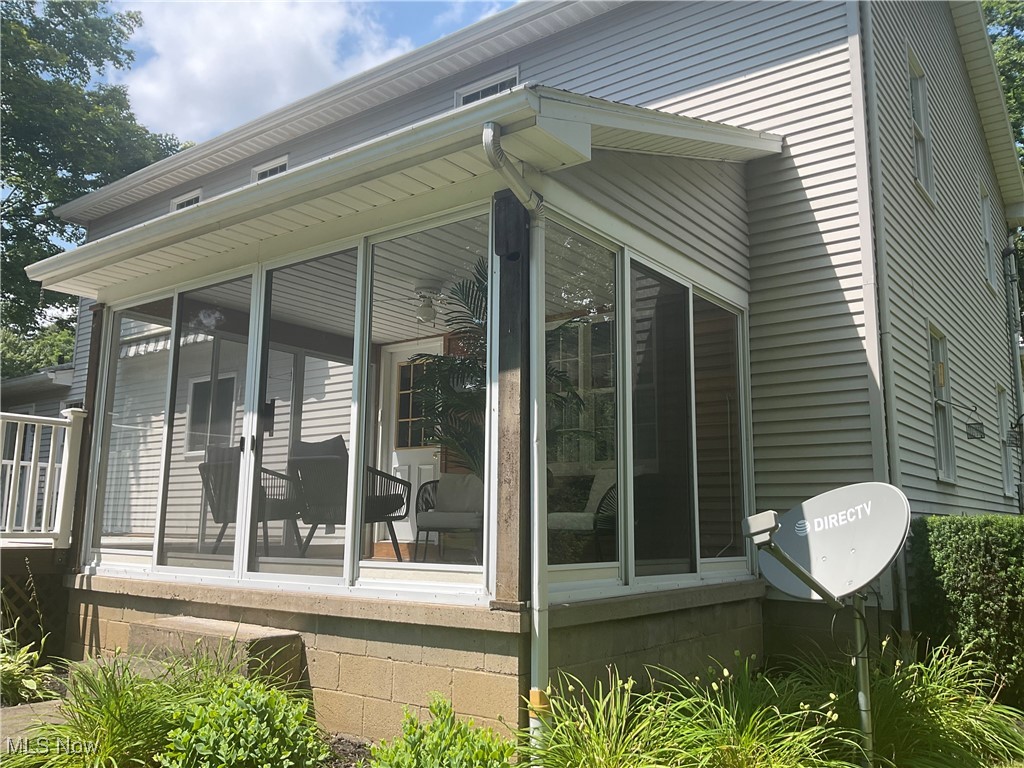 7345 Roller Road Salem, OH 44460 - Photo 32 of 50 View of property exterior featuring a sunroom