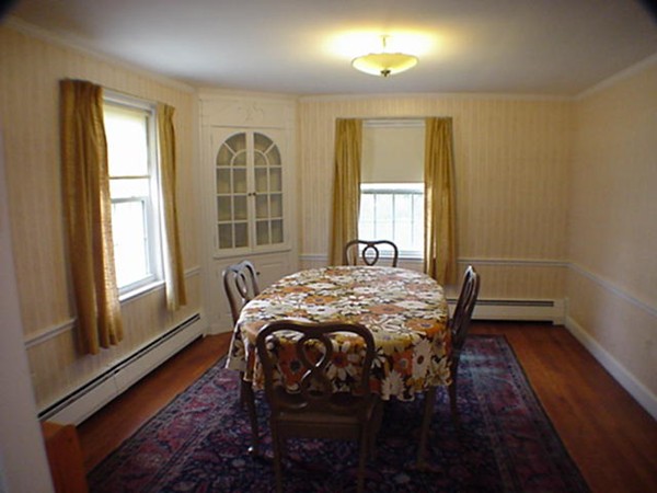 33 Stowecroft Road Arlington, MA 02474 - Photo 19 of 30 a bedroom with a bed and wooden floor