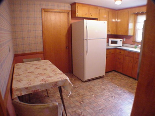 33 Stowecroft Road Arlington, MA 02474 - Photo 20 of 30 a refrigerator freezer sitting in a kitchen