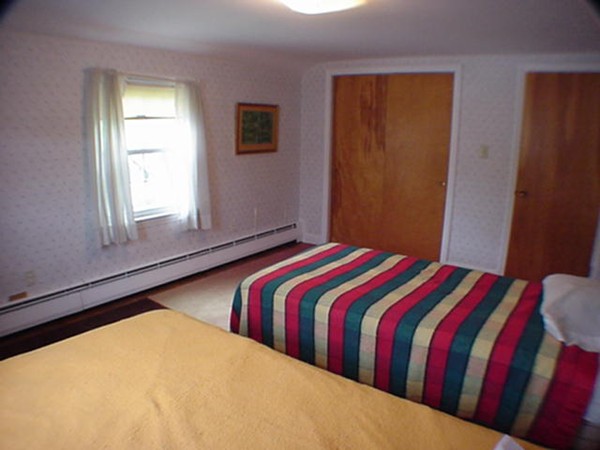 33 Stowecroft Road Arlington, MA 02474 - Photo 23 of 30 a bedroom with two beds and a window