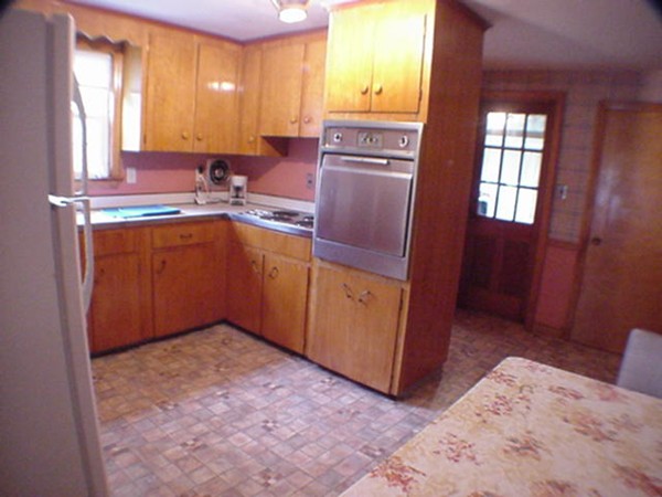 33 Stowecroft Road Arlington, MA 02474 - Photo 4 of 30 a view of kitchen with granite countertop cabinets and sink