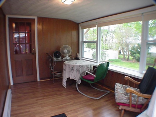 33 Stowecroft Road Arlington, MA 02474 - Photo 5 of 30 a living room with furniture and wooden floor
