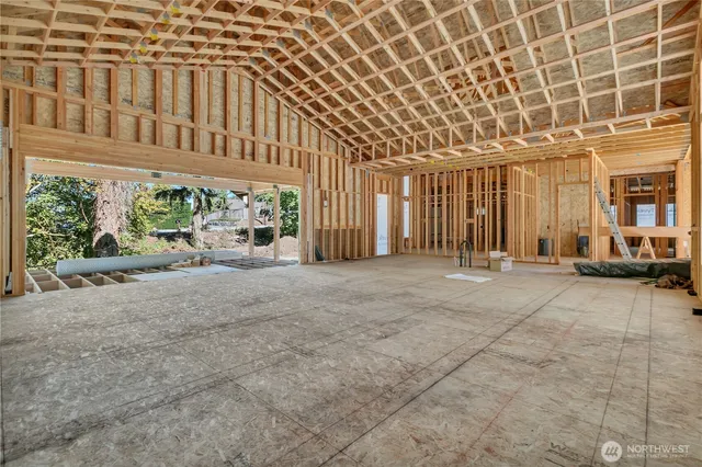 a view of swimming pool with outdoor seating and plants