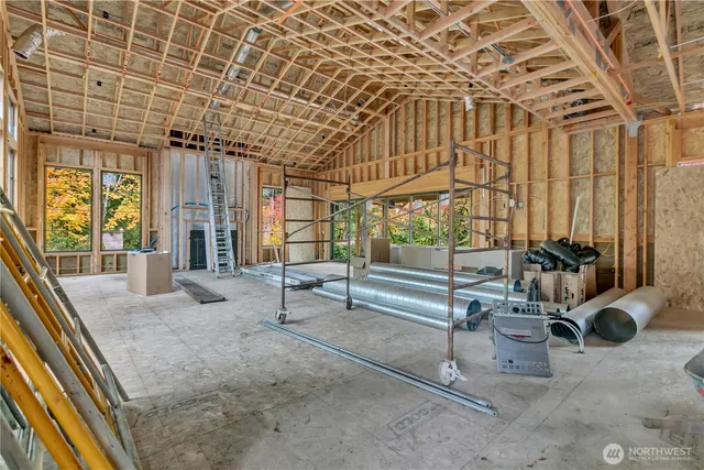 a view of an empty room with windows