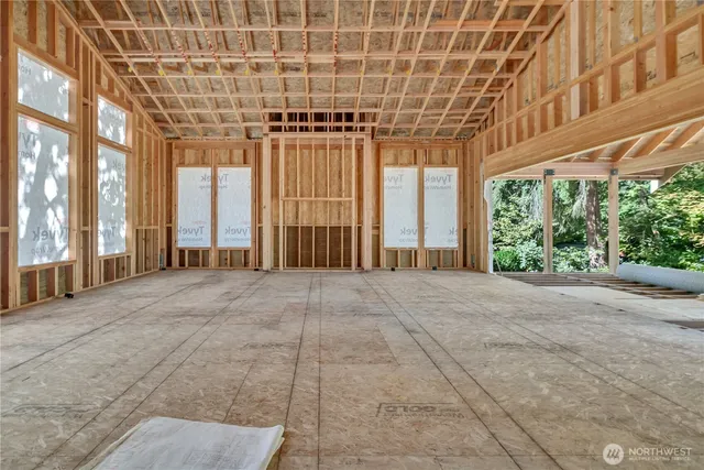a view of an empty room with a balcony