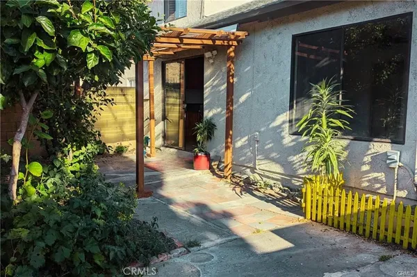 a view of a house and garden