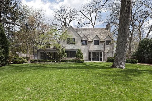 153 Ridge Lane Lake Forest, IL 60045 - Photo 2 of 15 a view of a house with a big yard and large trees