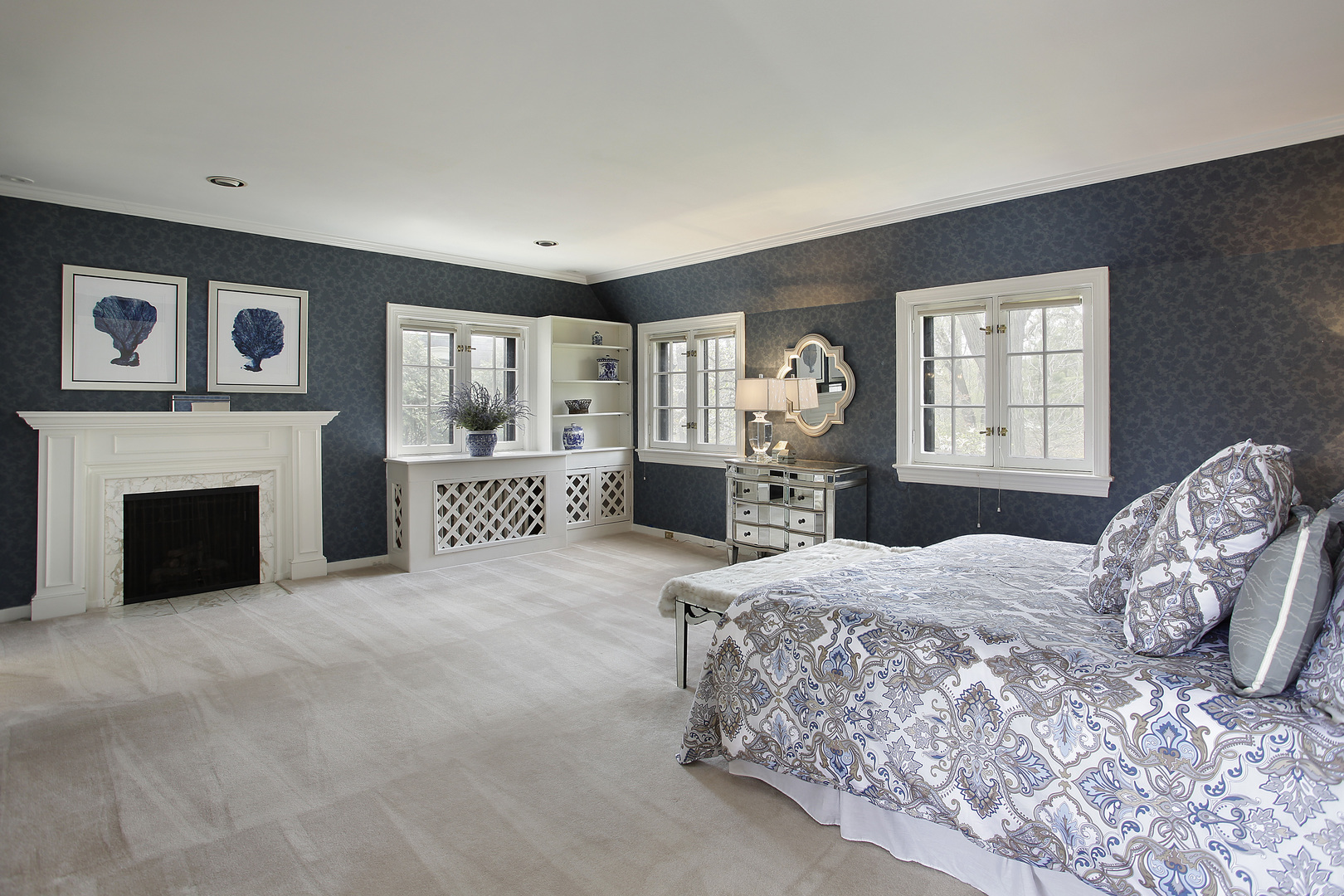 153 Ridge Lane Lake Forest, IL 60045 - Photo 10 of 15 a bedroom with a large bed and a fireplace