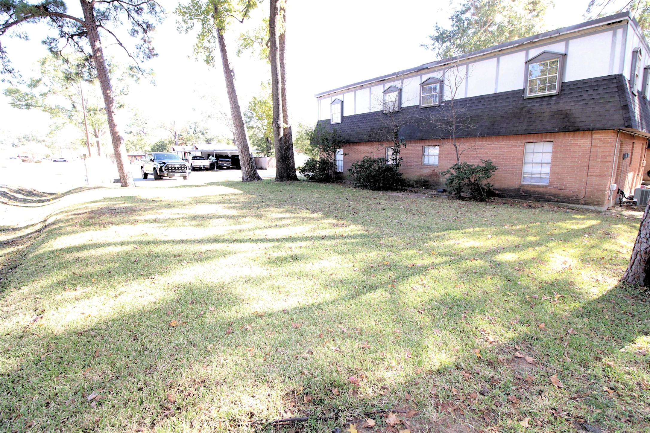 1305 Adams Street, Unit 7 Conroe, TX 77301 - Photo 12 of 12 a view of swimming pool with outdoor seating