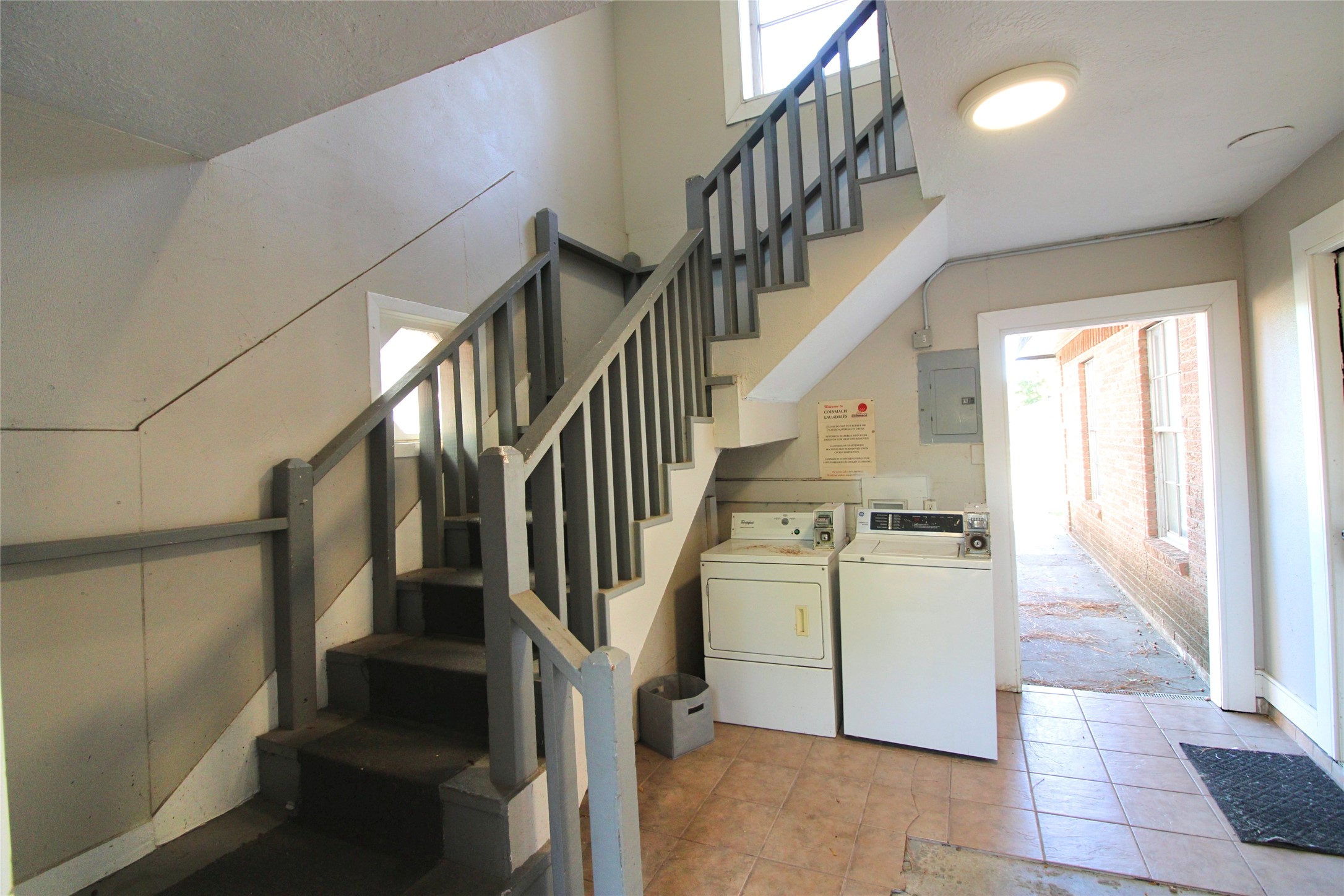 1305 Adams Street, Unit 7 Conroe, TX 77301 - Photo 10 of 12 a view of entryway and hall with wooden floor