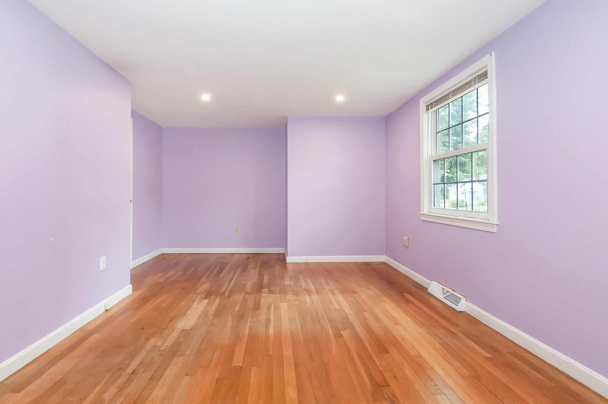 64 Taft Road West Yarmouth, MA 02673 - Photo 13 of 21 a view of an empty room with wooden floor and a window