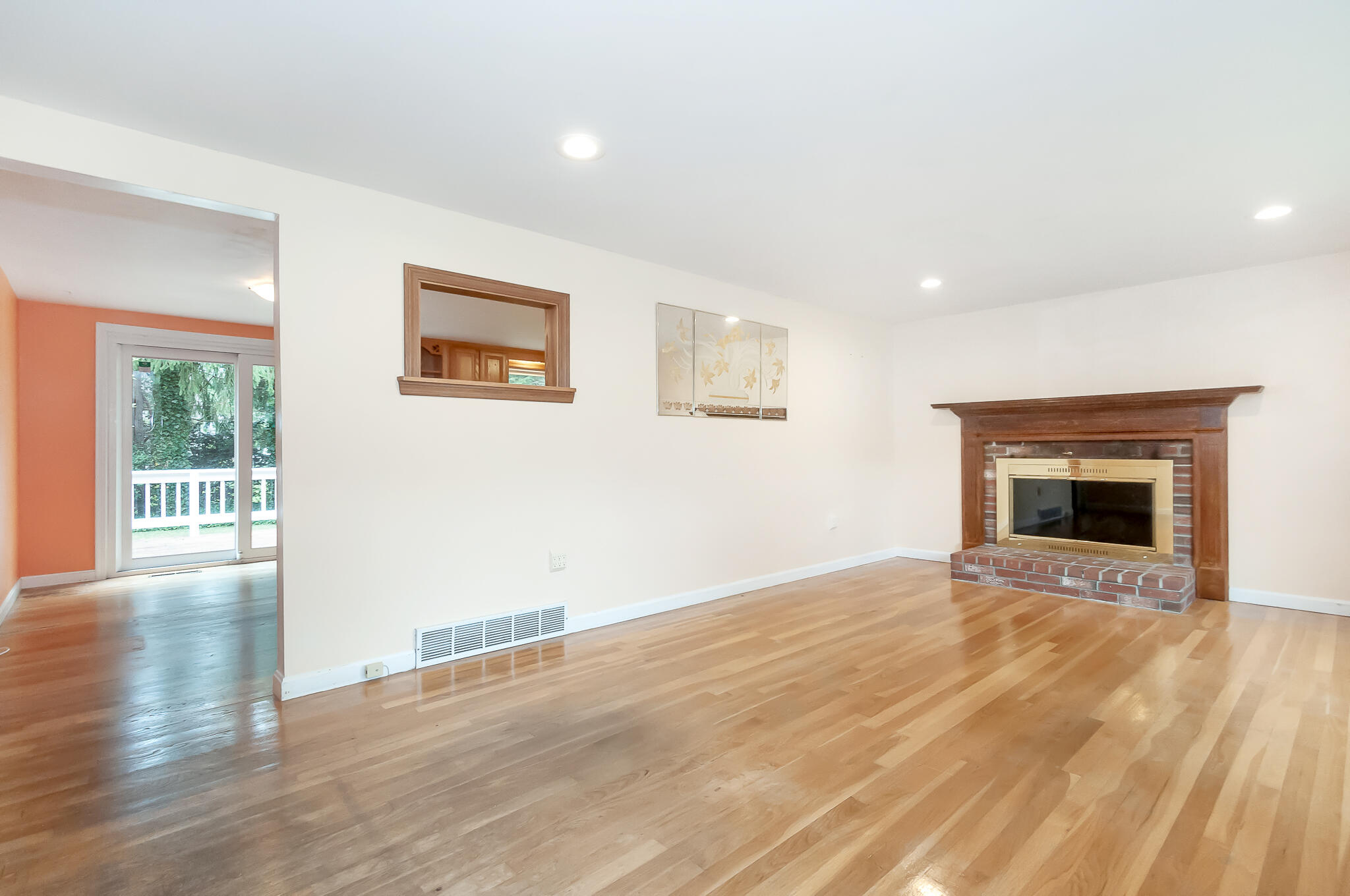 64 Taft Road West Yarmouth, MA 02673 - Photo 5 of 21 a view of an empty room with wooden floor and a window
