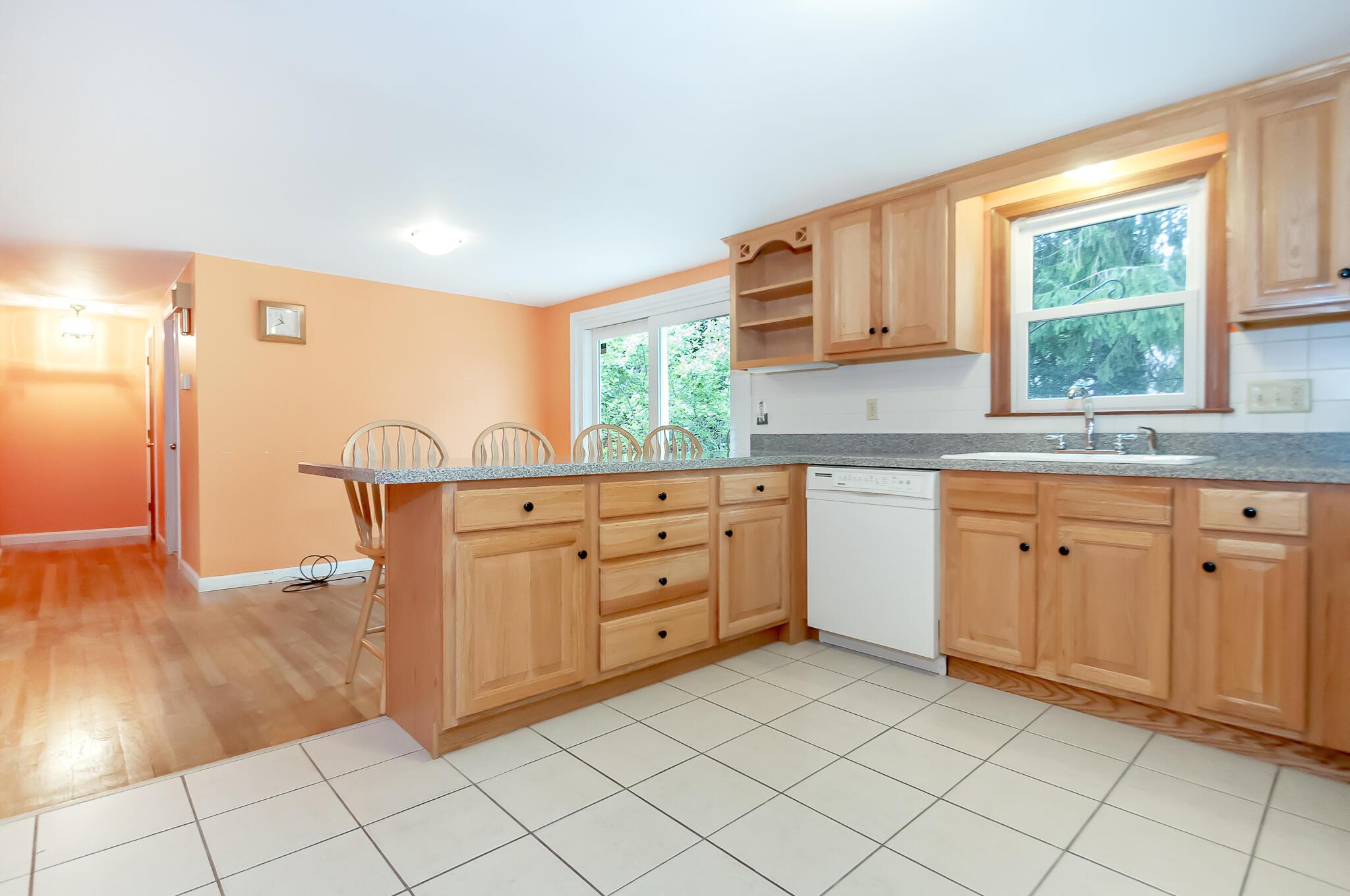 64 Taft Road West Yarmouth, MA 02673 - Photo 9 of 21 a kitchen with white cabinets and window