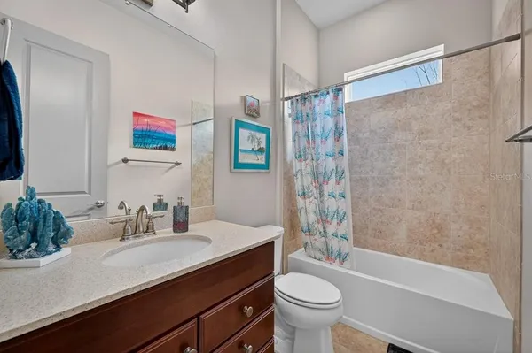 a view of a livingroom with furniture and garage