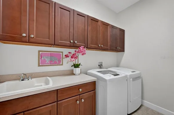 an aerial view of residential house with outdoor space