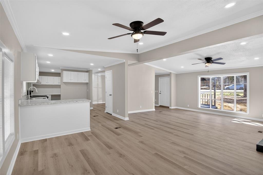 6949 Klug Pines Road Shreveport, LA 71129 - Photo 5 of 18 View of Dining area into Kitchen and Living