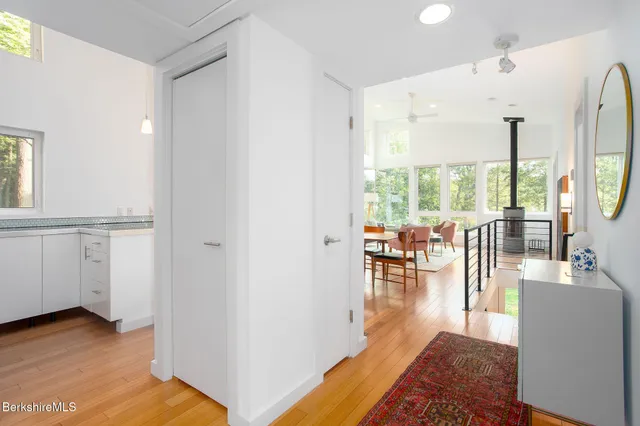a bedroom with a bed and a cabinets