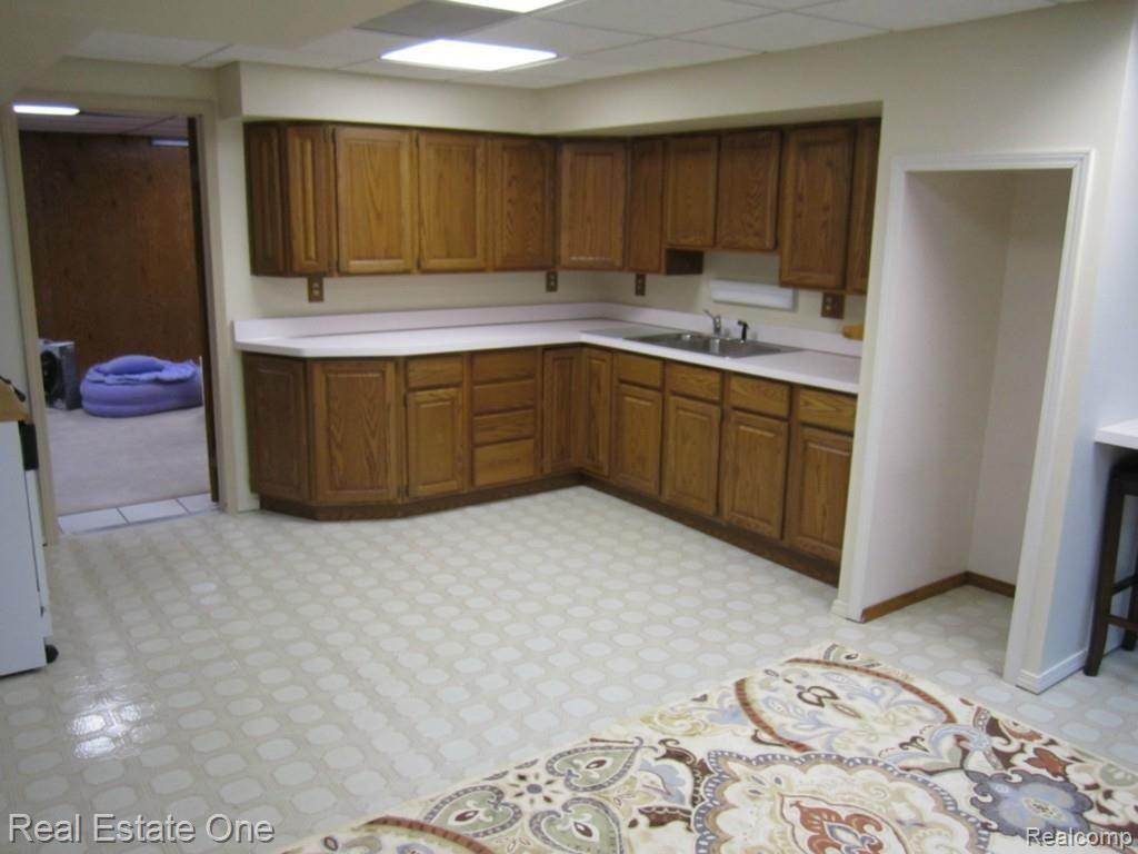 35591 Tall Pine Road Farmington, MI 48335 - Photo 26 of 31 Finished Walkout Kitchen
