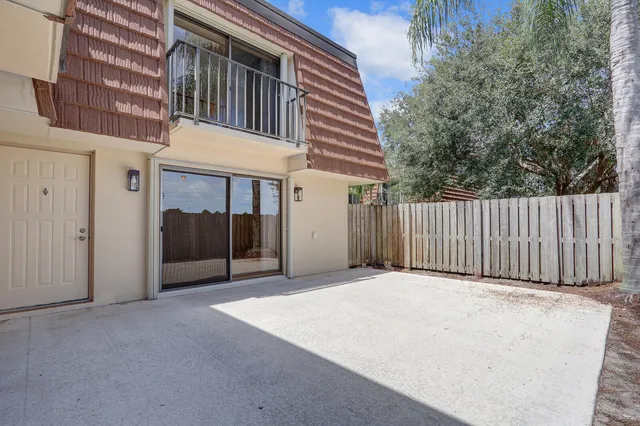 a view of a house with a garage