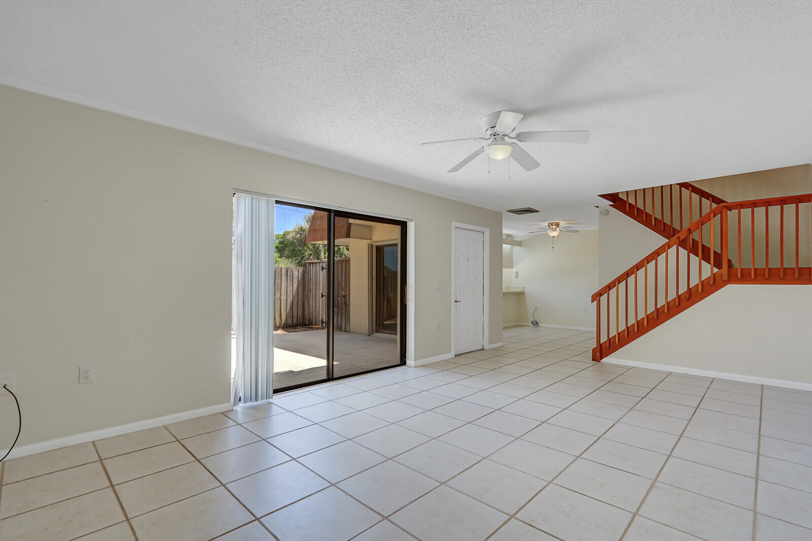 3026 30th Court Jupiter, FL 33477 - Photo 3 of 15 a view of an entryway with staircase
